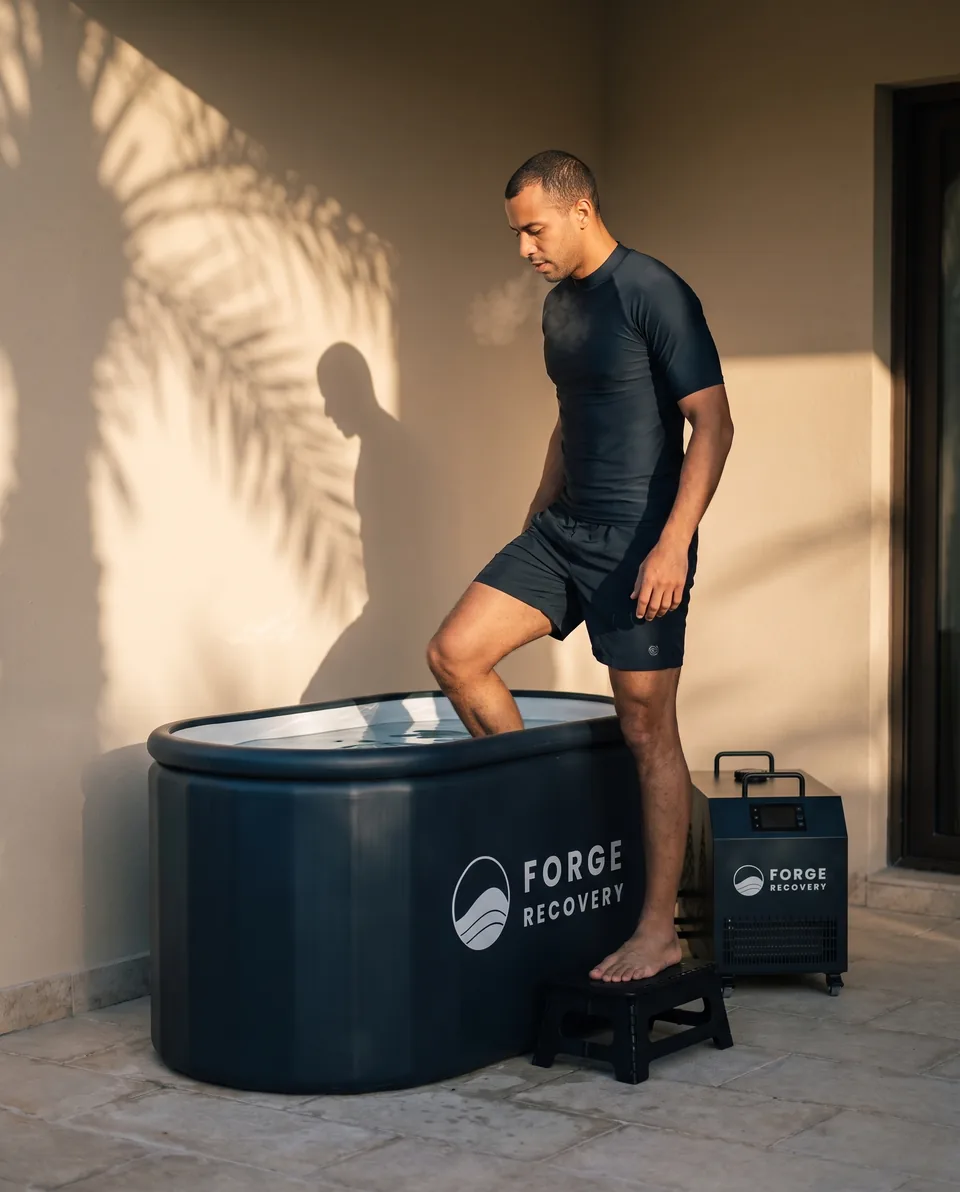 Stepping into a Forge Recovery cold plunge